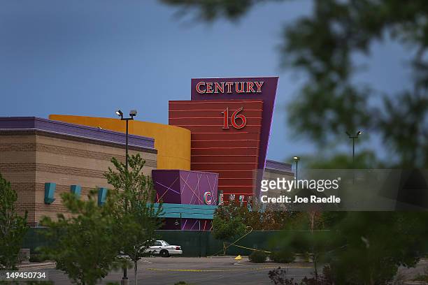 The Century 16 movie theatre is seen from a memorial setup across the street on July 28, 2012 in Aurora, Colorado. Twenty-four-year-old James Holmes...