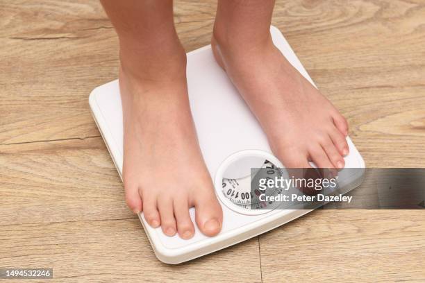 11 year old with obesity issues - childhood obesity stock pictures, royalty-free photos & images