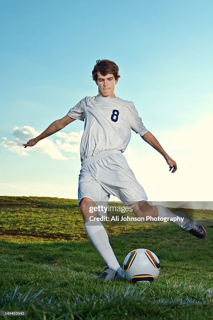 High school students playing soccer