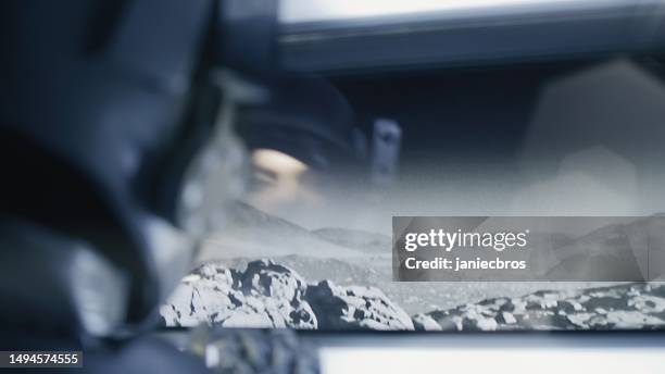 shaky moon rover trip over the barren surface of the moon. astronaut looking out the window - shaky stock pictures, royalty-free photos & images