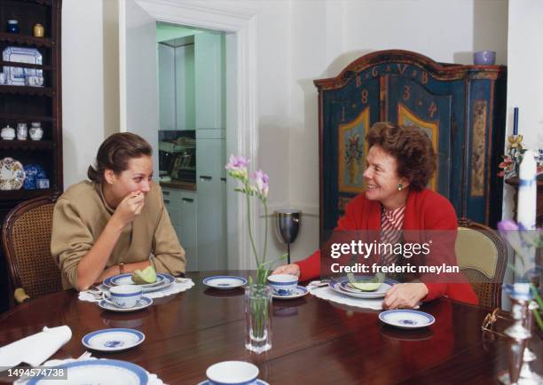 American model Christy Turlington with american model agency executive Eileen Ford at Ford's townhouse.