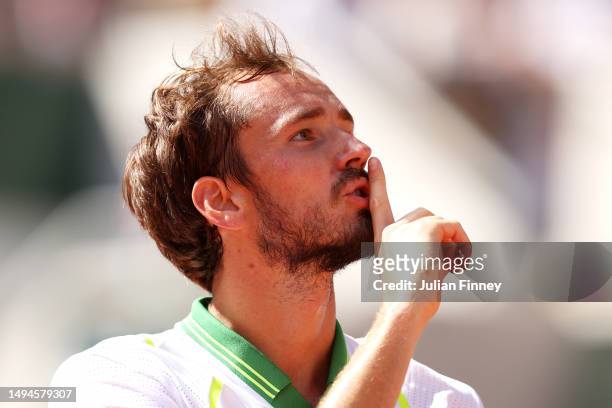 Daniil Medvedev puts his finger to his lips towards the crowd against Thiago Seyboth Wild of Brazil during their Men's Singles First Round Match on...