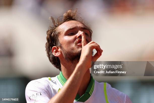 Daniil Medvedev puts his finger to his lips towards the crowd against Thiago Seyboth Wild of Brazil during their Men's Singles First Round Match on...