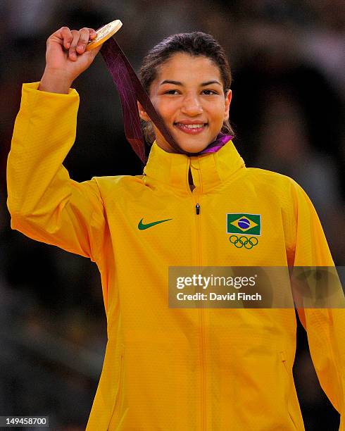 Sarah Menezes of Brazil poses during the medal ceremony in the Judo 48 kgs women's category on Day 1 of the London 2012 Olympic Games at the ExCeL...