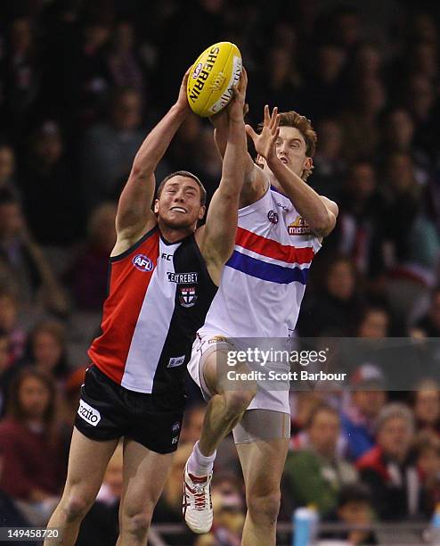 Tom Williams of the Bulldogs competes for the ball during the round 18 AFL match between the St Kilda Saints and the Western Bulldogs at Etihad...