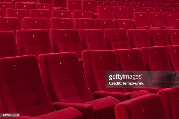 red chairs - stage performance space stock pictures, royalty-free photos & images