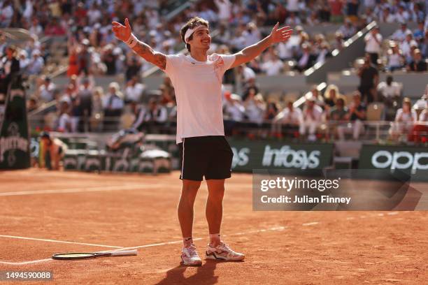 Thiago Seyboth Wild of Brazil celebrates winning match point against Daniil Medvedev during their Men's Singles First Round Match on Day Three of the...