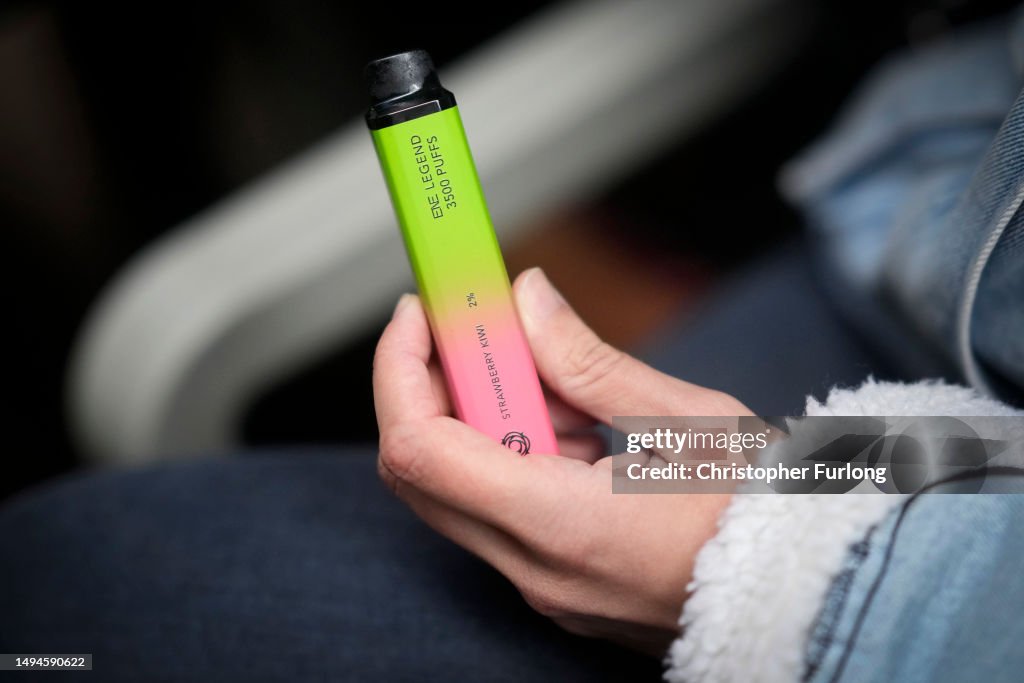 British Rapper Vaping A woman holds a vaping device on May 30, 2023 in Manchester, England ...