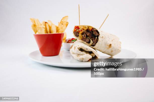 close-up of food in plate on table against white background,ankara,turkey - raw fajita beef stock pictures, royalty-free photos & images