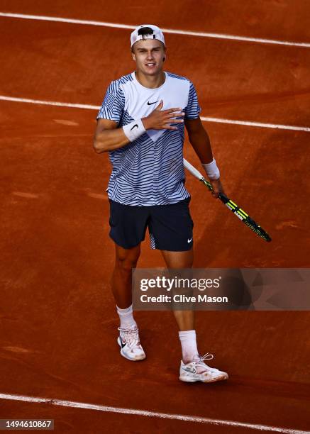 Holger Rune of Denmark celebrates winning match point against Christopher Eubanks of United States during their Men's Singles First Round Match on...