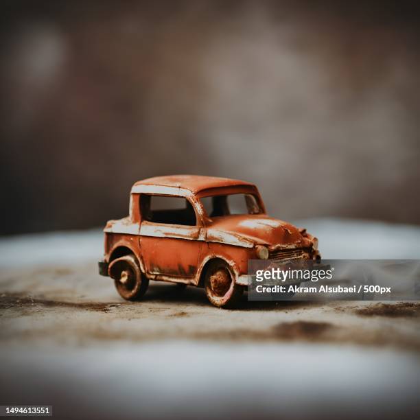 rustic remnants vintage toy cars in macro,yemen - rusty car stock-fotos und bilder