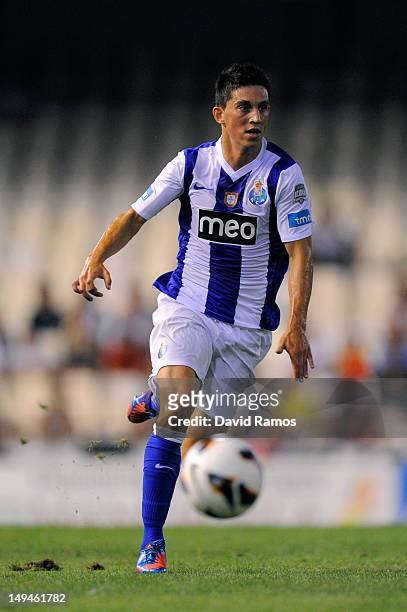 Andre Castro of Porto CF runs with the ball during a Pre-Season friendly match between Valencia CF and FC Porto at Estadio Mestalla on July 28, 2012...