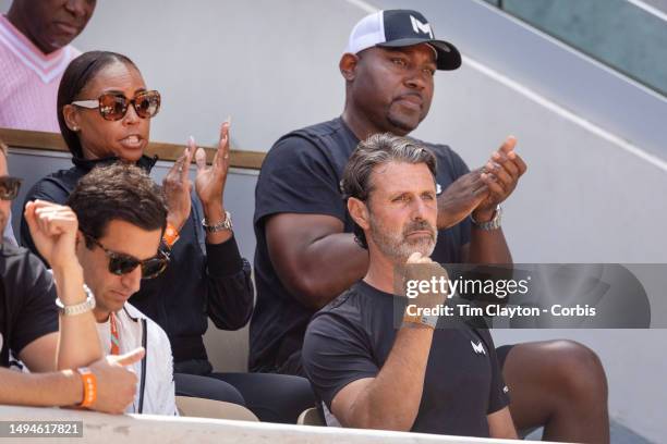 Coach Patrick Mouratoglou and parents Candi Gauff and Corey Gauff applaud a point from Coco Gauff of the United States during her victory against...