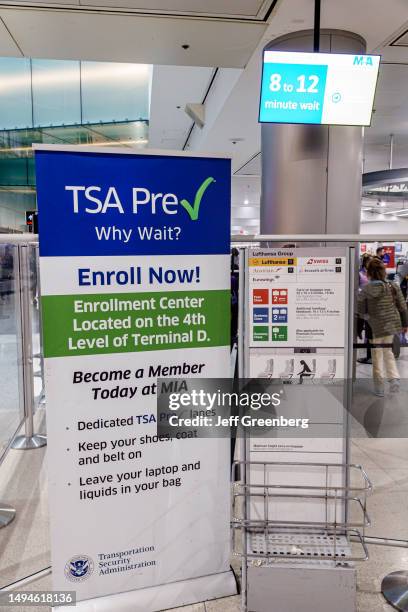 Miami, Florida, Miami International Airport, airport terminal, TSA pre-check enrollment offer promotion.