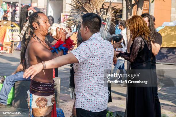 Mexico City, Mexico, Zocalo Plaza de la Constitucion, indigenous Indian ceremony, ritual Aztec shaman performing spiritual cleansing.