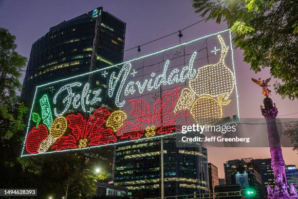 Mexico City, Mexico, Feliz Navidad, Merry Christmas, electric lights sign over street.