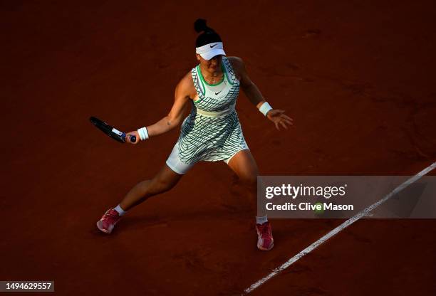 Bianca Andreescu of Canada plays a forehand against Viktoria Azarenka during their Women's Singles First Round Match on Day Three of the 2023 French...