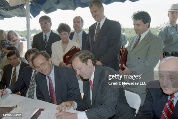 Westhampton, N.Y. Suffolk County, New York, Executive Robert Gaffney , looks on as New York State Gov. George Pataki signs the Central Pine Barrens...