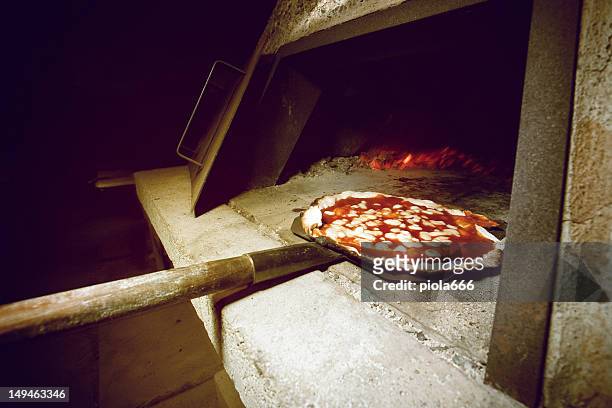 real italian pizza maker at work - pizza chef stock pictures, royalty-free photos & images
