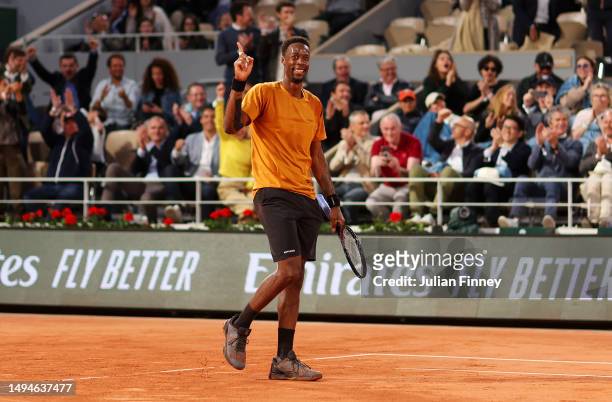 Gael Monfils of France celebrates winning the first set against Sebastian Baez of Argentina during their Men's Singles First Round Match on Day Three...