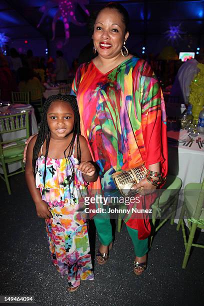 Miley Simmons and Justine Simmons attend the 13th Annual Russel Simmons Rush philanthropic ART FOR LIFE on July 28, 2012 in East Hampton, New York.