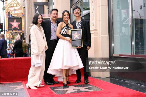 Michaela Zee, Eric Michael Zee, Ming-Na Wen, and Cooper Dominic Zee attend ceremony honoring Ming-Na Wen with a star on the Hollywood Walk of Fame on...