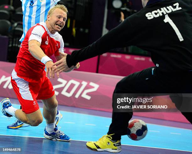 Iceland's leftback Gudjon Valur Sigurdsson shoots during the men's preliminaries Group A handball match Iceland vs Argentina for the London 2012...