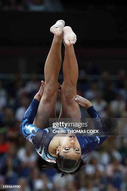 Guatemala's gymnast Ana Sofia Gomez Porras performs on the beam during the women's qualification of the artistic gymnastics event of the London...