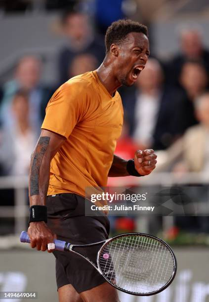 Gael Monfils of France celebrates against Sebastian Baez of Argentina during their Men's Singles First Round Match on Day Three of the 2023 French...