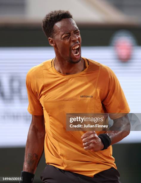 Gael Monfils of France celebrates against Sebastian Baez of Argentina during their Men's Singles First Round Match on Day Three of the 2023 French...