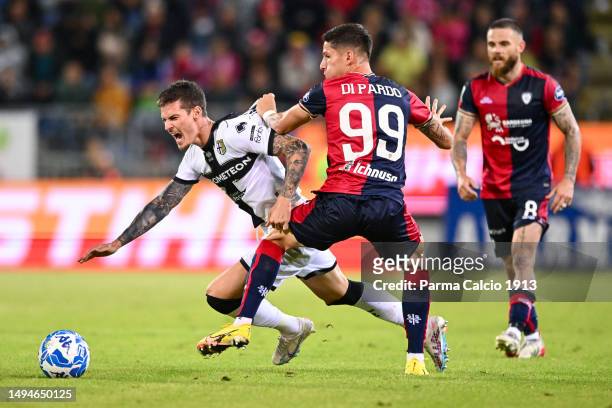 Dennis Man of Parma Calcio tackle against Alessandro Di Pardo of Cagliari during the Serie B Playoffs match between Cagliari and Parma Calcio on May...