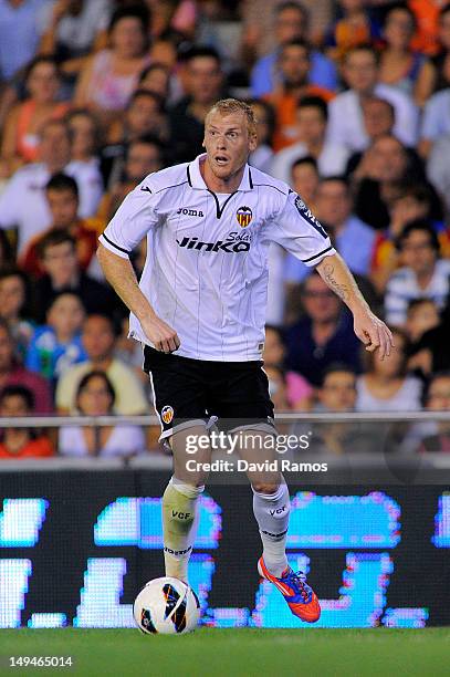 Jeremy Mathieu of Valencia runs with the ball during a Pre-Season friendly match between Valencia CF and FC Porto at Estadio Mestalla on July 28,...