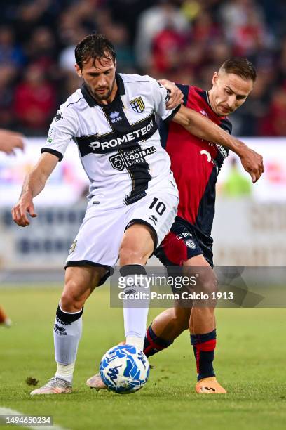 Franco Vazquez fights for the possession during the Serie B Playoffs match between Cagliari and Parma Calcio on May 30, 2023 in Cagliari, Italy.