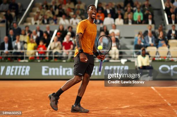 Gael Monfils of France celebrates against Sebastian Baez of Argentina during their Men's Singles First Round Match on Day Three of the 2023 French...