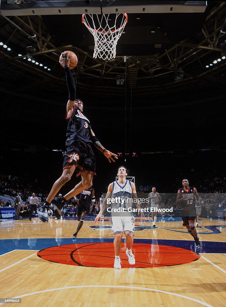 Allen Iverson shoots a lay up