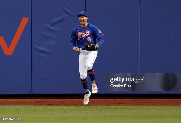 Brandon Nimmo of the New York Mets reacts after he caught a hit by Nick Castellanos of the Philadelphia Phillies in the fourth inning for the out at...