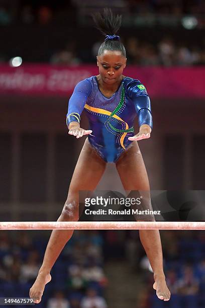 Daiane dos Santos of Brazil competes in the uneven bars in the Artistic Gymnastics Women's Team qualification on Day 2 of the London 2012 Olympic...
