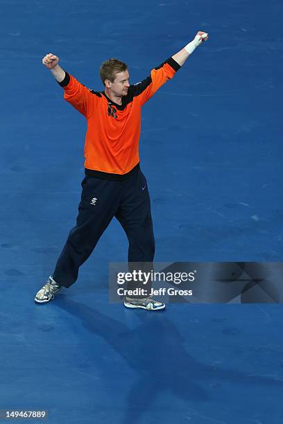 Hreidar Levy Gudmundsson of Iceland celebrates their victory in the Men's Handball Preliminaries Group A match between Iceland and Argentina on Day 2...