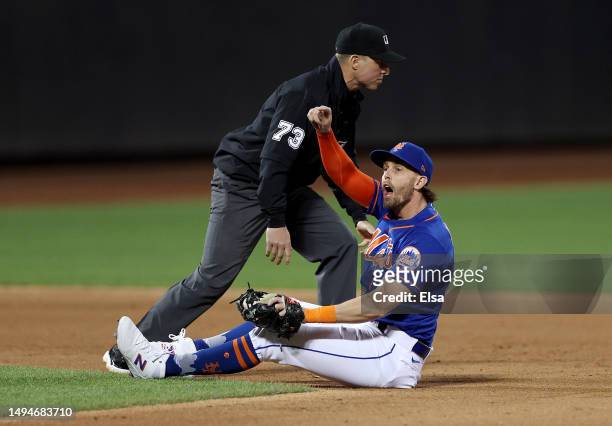 Jeff McNeil of the New York Mets reacts after he caught J.T. Realmuto of the Philadelphia Phillies stealing at Citi Field on May 30, 2023 in the...