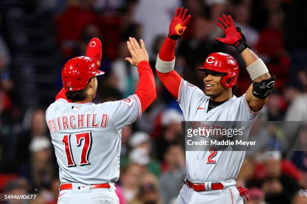 Jose Barrero of the Cincinnati Reds celebrates with Stuart Fairchild after hitting a grand slam against the Boston Red Sox during the seventh inning...