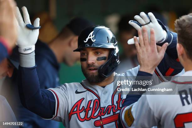 Kevin Pillar of the Atlanta Braves celebrates after hitting a solo home run in the top of the third inning against the Oakland Athletics at...