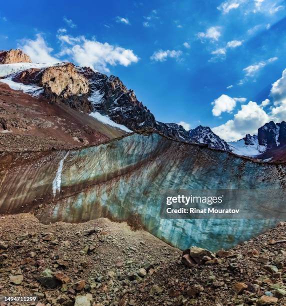 melting bogdanovich glacier in tien shan mountains near the almaty city, kazakhstan - montañas de tien shan fotografías e imágenes de stock