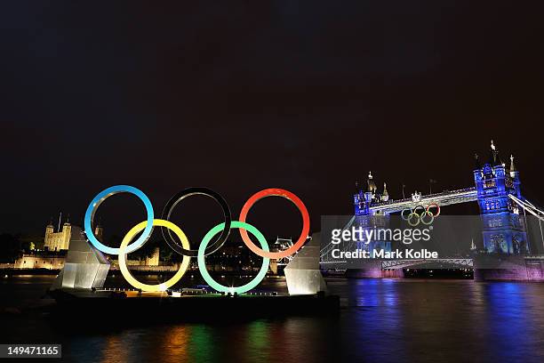 The Olympic rings are seen at Tower Bridge as part of the Opening Ceremony of the London 2012 Olympic Games at the Olympic Stadium on July 27, 2012...