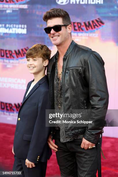 Julian Fuego Thicke and Robin Thicke attend the world premiere of "Spider-Man: Across The Spider-Verse" at Regency Village Theatre on May 30, 2023 in...