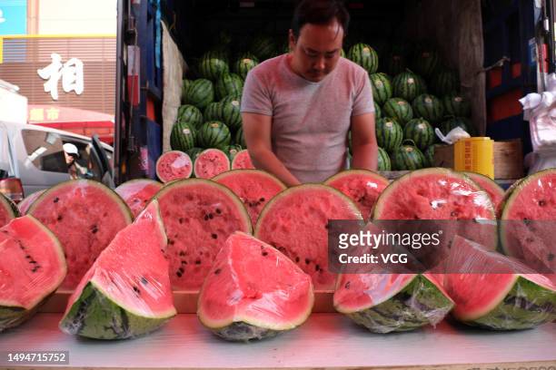 Vendor sells watermelons at a market on May 31, 2023 in Shenyang, Liaoning Province of China.