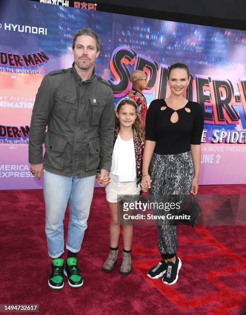 Stephen Amell, Cassandra Jean and daughter Mavi arrives at the World Premiere Of Sony Pictures Animation's "Spider-Man" Across The Spider Verse" at...