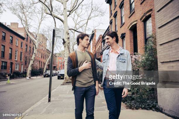 gay men walking down street in city - brooklyn heights stock pictures, royalty-free photos & images
