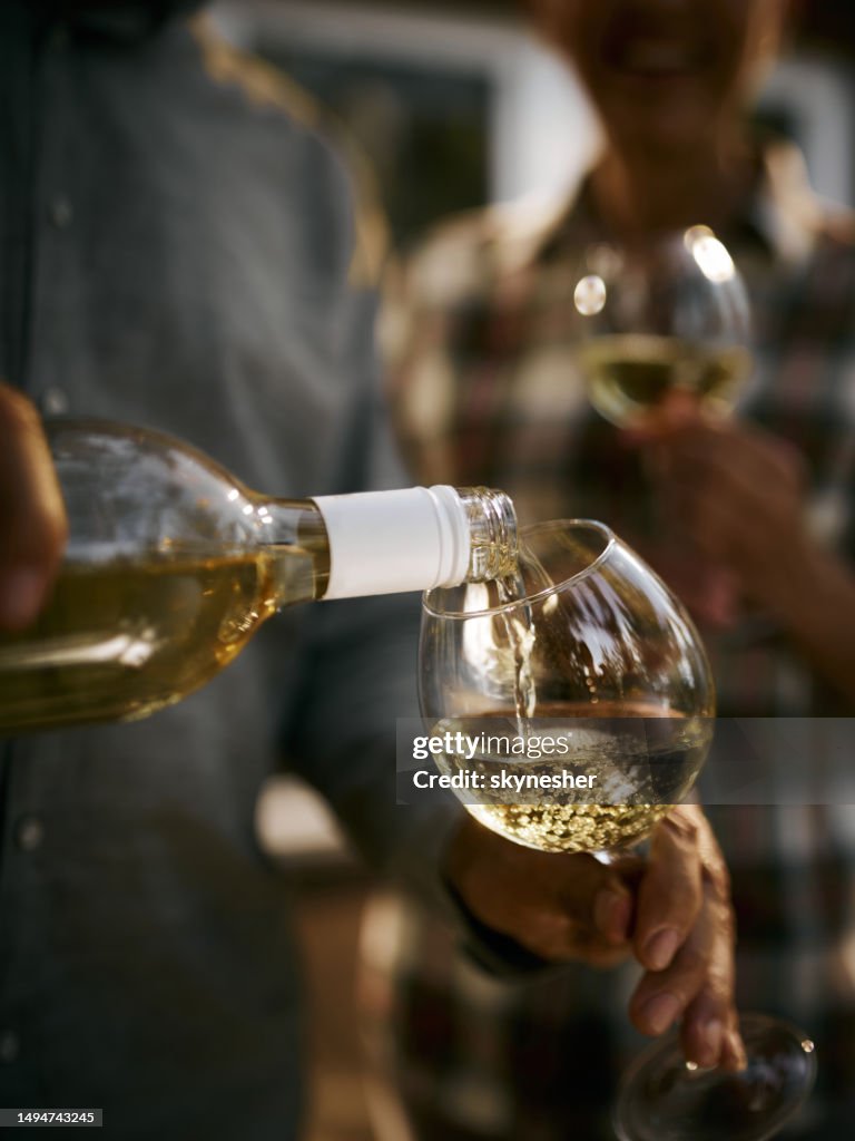 Pouring white wine into a glass!
