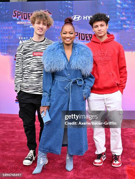 Jaid Thomas Nilon, Garcelle Beauvais, and Jax Joseph Nilon attend the World Premiere of Sony Pictures Animation's "Spider-Man: Across the Spider...