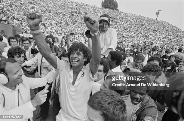 Yannick Noah of France crying in celebration after defeating Mats Wilander of Sweden in the Men's Singles Final of the French Open Tennis...